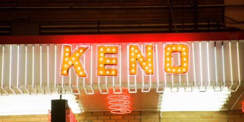 a neon sign with a word keno a neon sign with a word keno